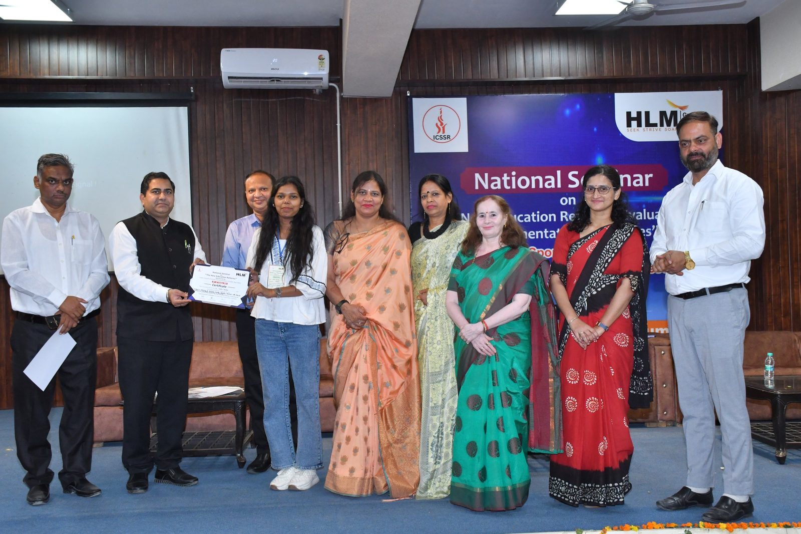 Certificate distribution and group photo at the ICSSR sponsored National Seminar