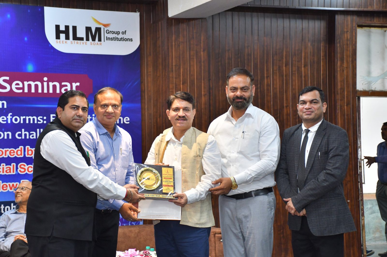Felicitation of the speaker with a memento at the National Seminar