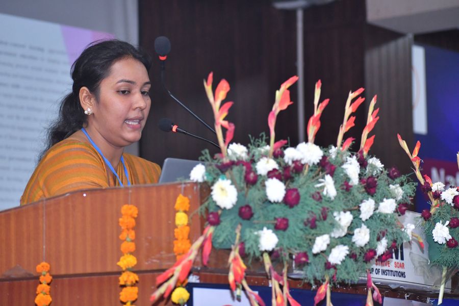 Delegate presenting a research paper at the seminar